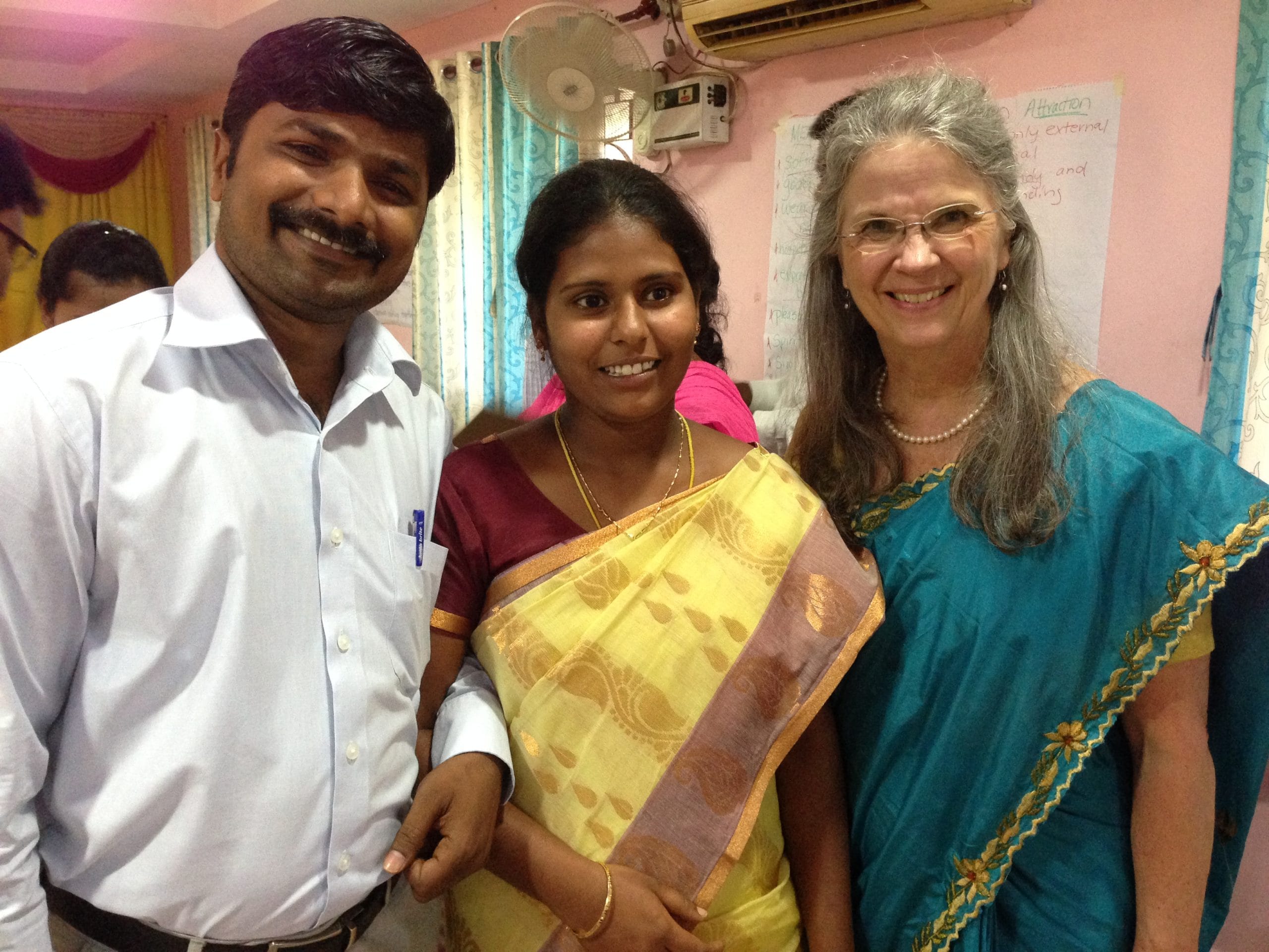 Debbie Dortzbach of World Relief with a couple in India who participated in the Families for Life Training.