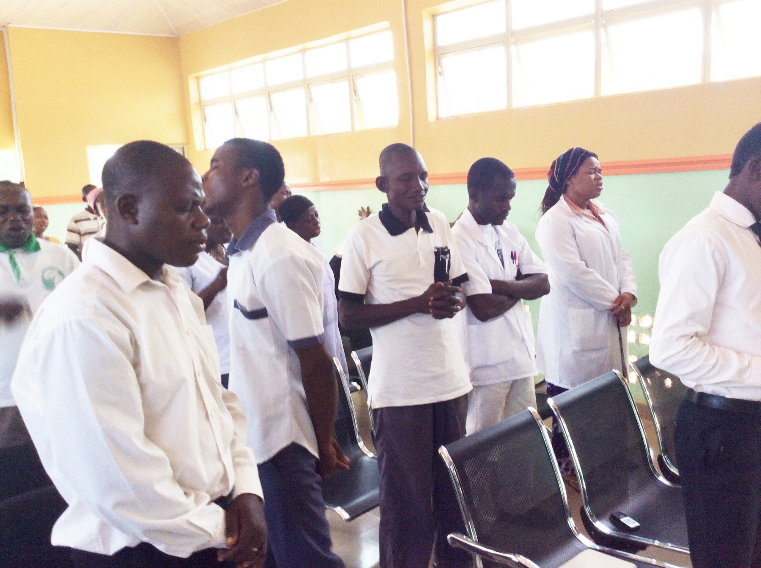 Health Team Members in Daily Morning Prayer Devotion.