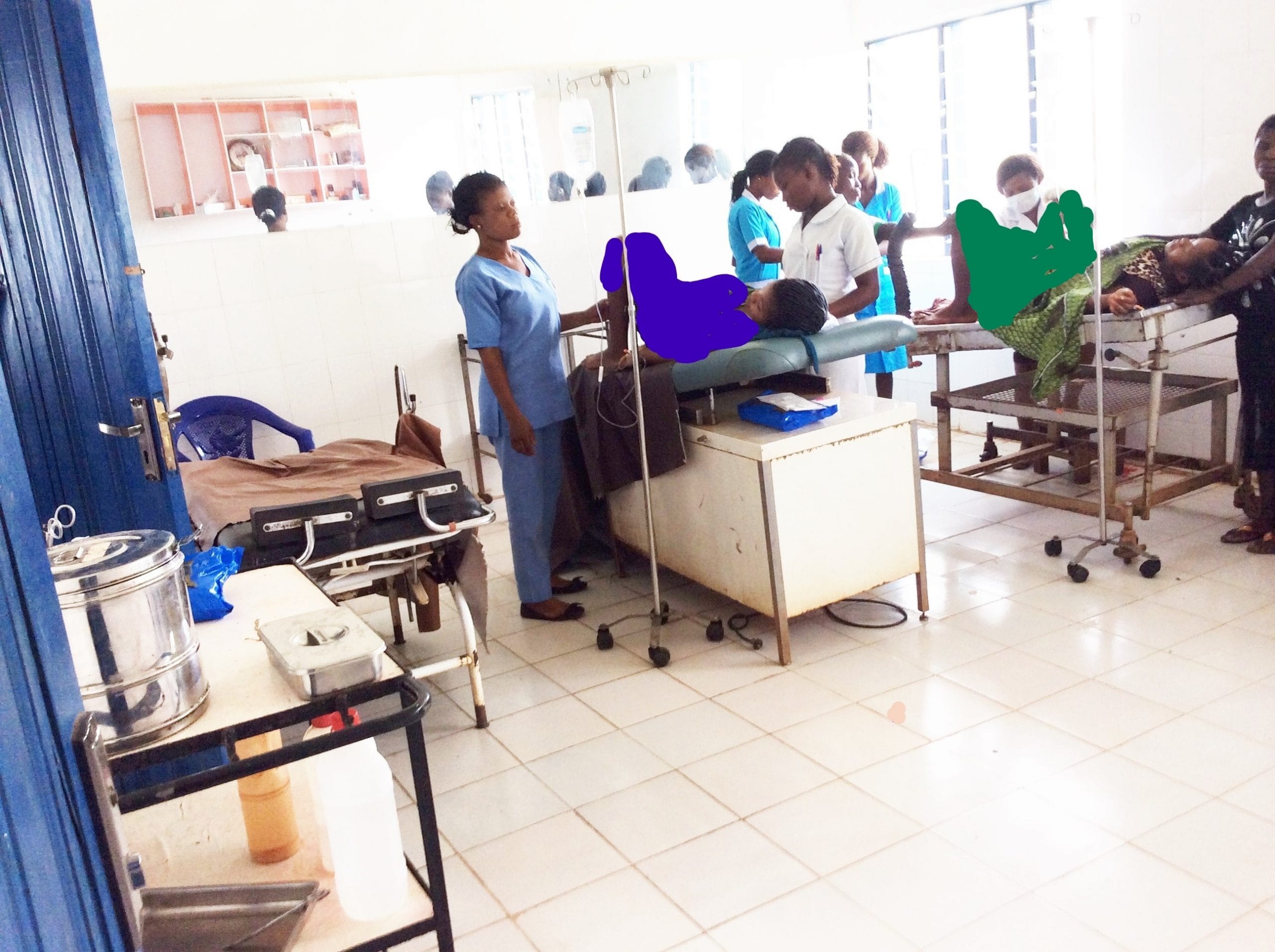 Health workers attend to patients in a maternity ward in Nigeria. 