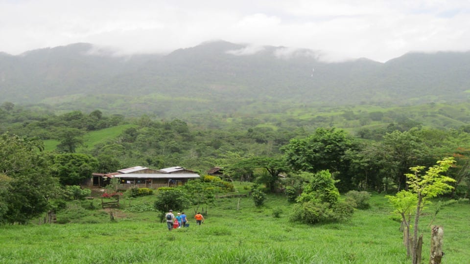 A scene from rural Nicaragua with mountains in the background.