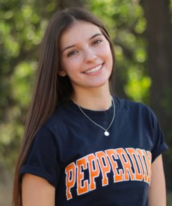 A female college student in a Pepperdine tshirt